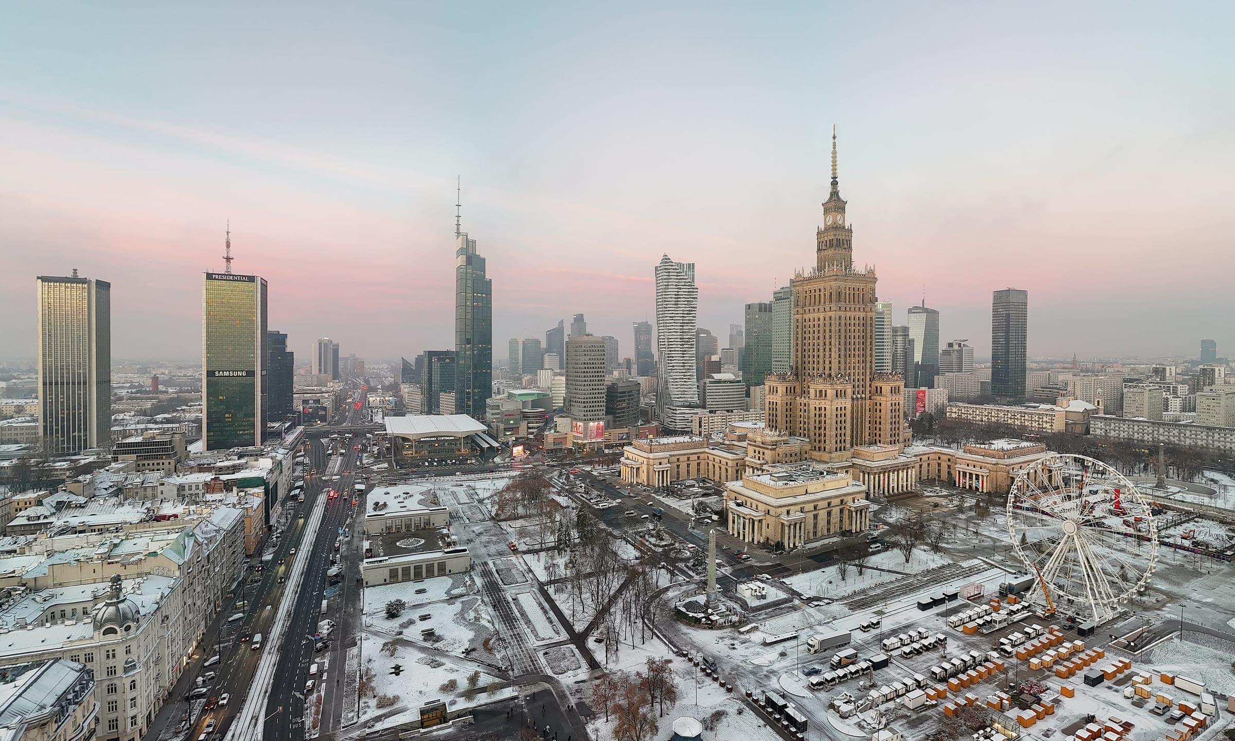Warsaw's skyline in winter, with the Palace of Culture and Science among glass towers
